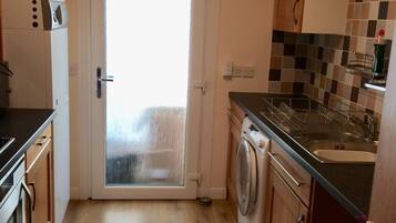 Apartment, 2 Bedrooms | Private kitchen | Full-sized fridge, microwave, oven, stovetop