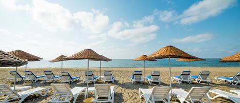 Private beach, sun-loungers, beach umbrellas