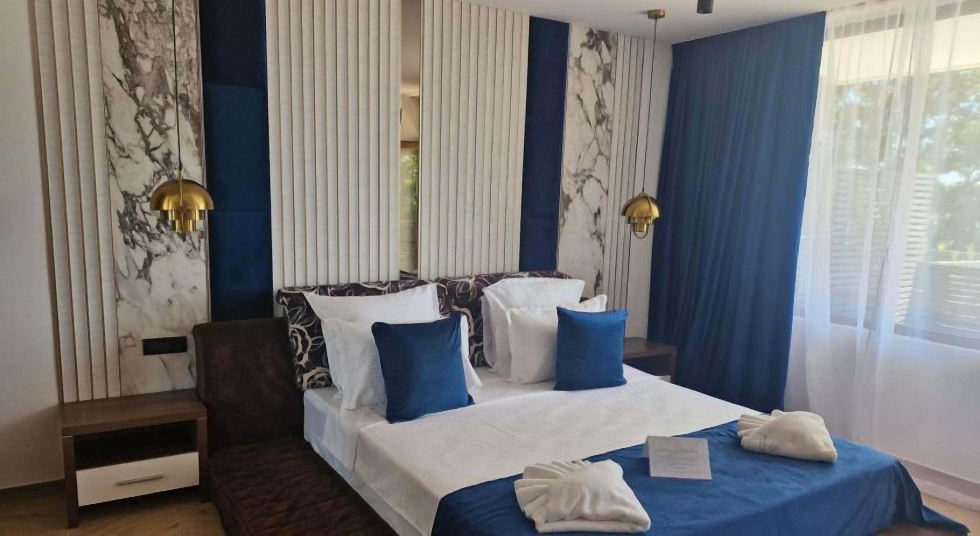 Deluxe Double Room | 1 bedroom, premium bedding, minibar, individually furnished