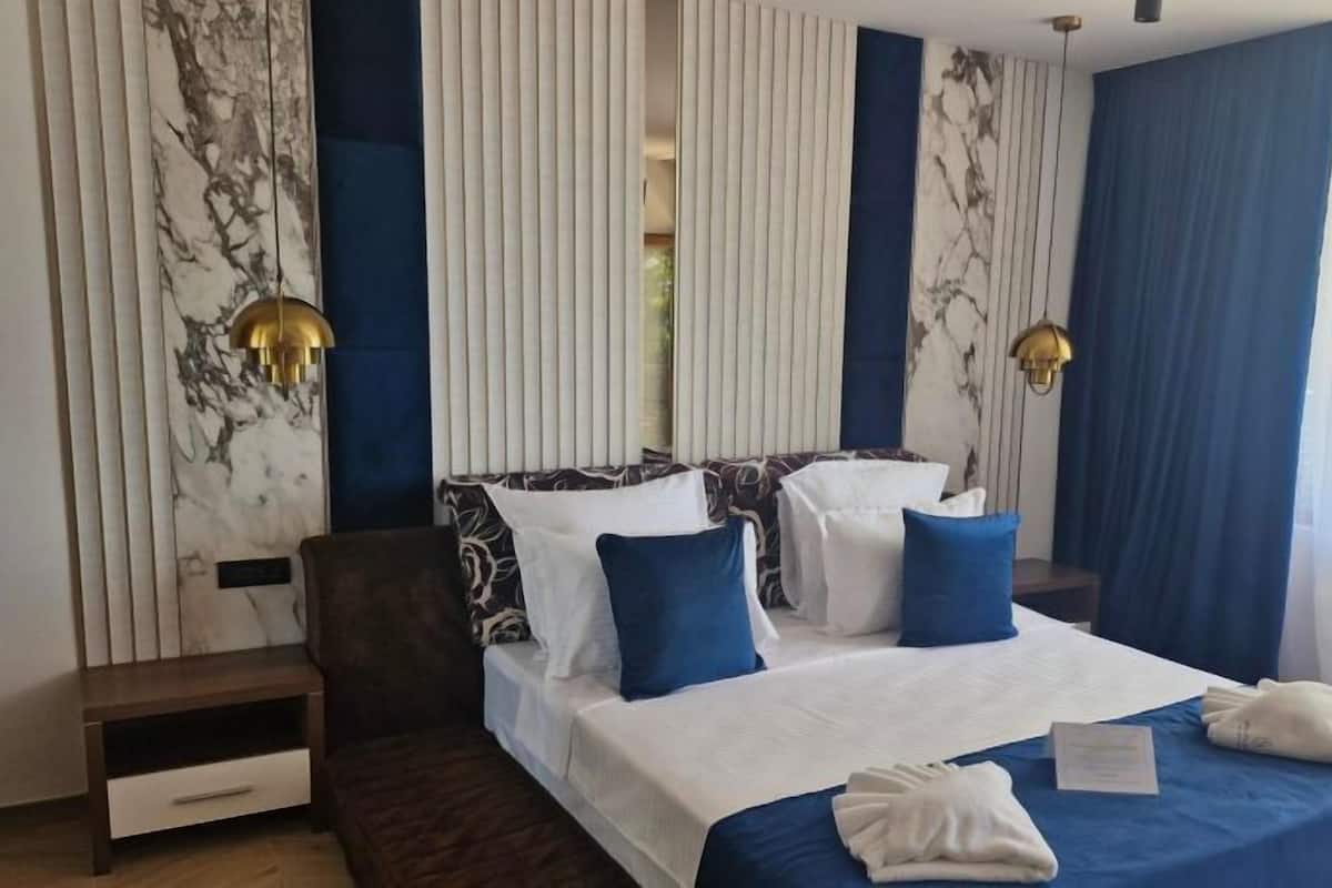 Kamar Double Deluks | 1 kamar tidur, seprai premium, minibar, dan tirai kedap cahaya
