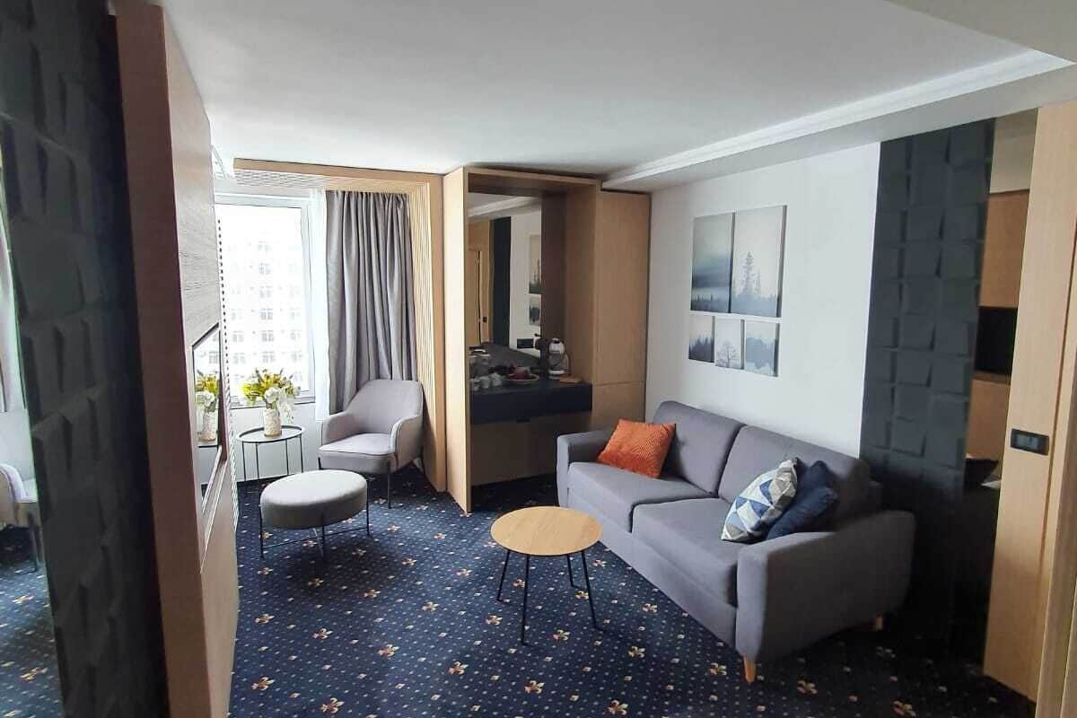 superior suite | living area | flat-screen tv