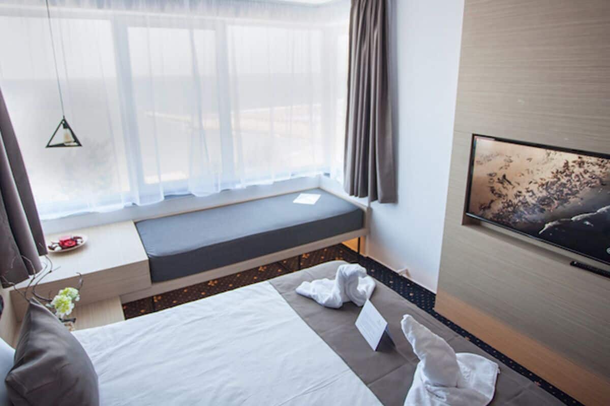 Kamar Double Deluks, pemandangan laut | 1 kamar tidur, seprai premium, minibar, dan tirai kedap cahaya