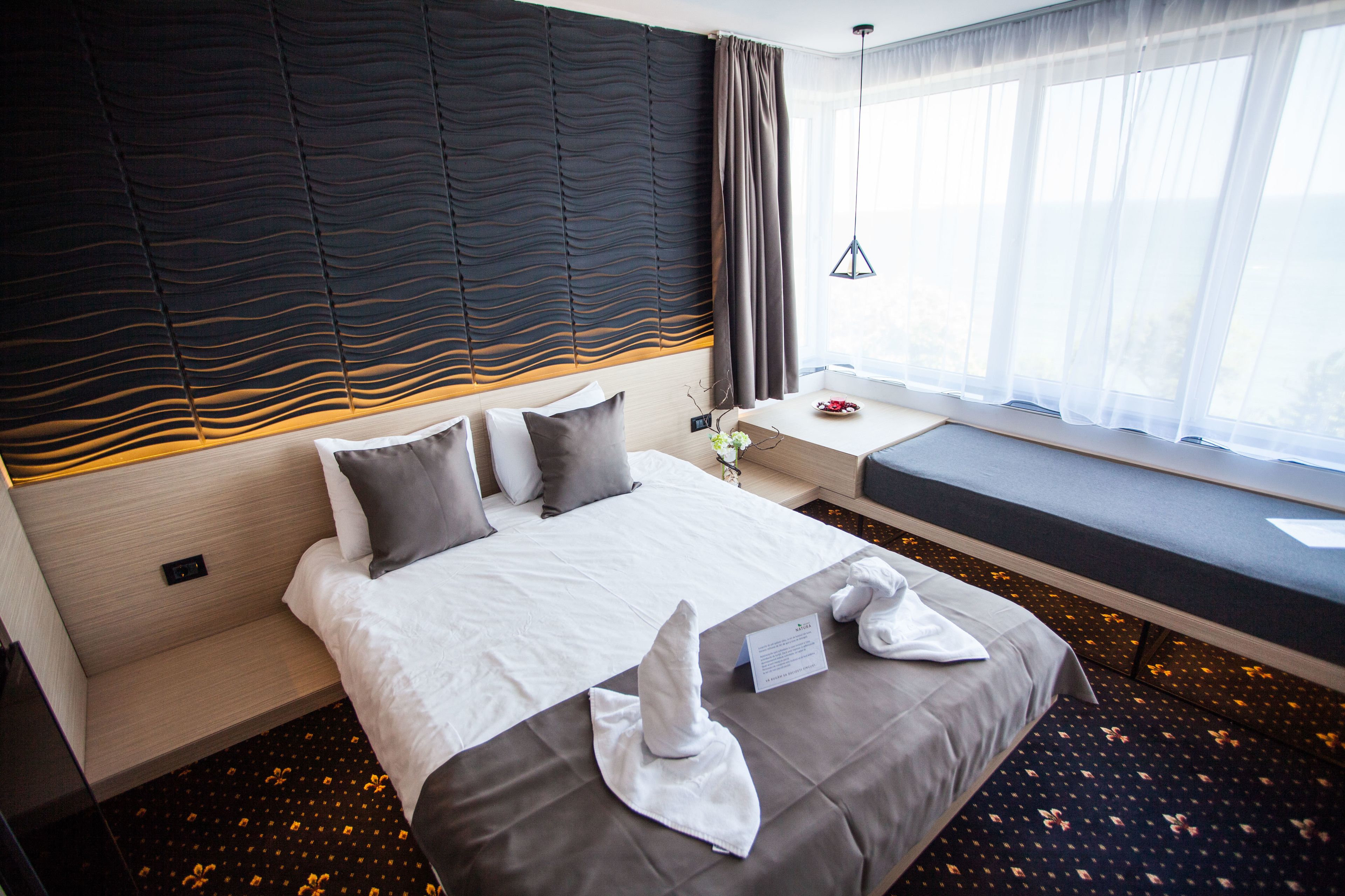 deluxe double room, sea view | premium bedding, minibar, individually furnished, desk