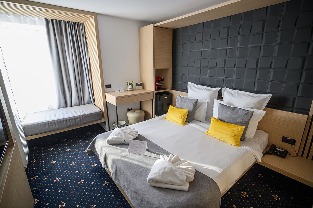 Premium Double Room, 1 Queen Bed, Partial Sea View | 1 bedroom, premium bedding, minibar, individually furnished