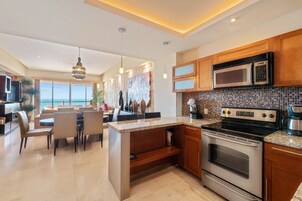 Condo | Private kitchen | Full-size fridge, microwave, oven, stovetop