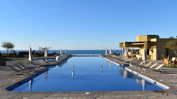 Outdoor pool, pool umbrellas, sun loungers