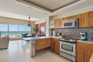 Condo | Private kitchen | Full-size fridge, microwave, oven, stovetop