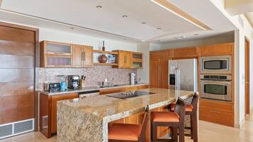 Condo | Private kitchen | Coffee/tea maker, full-size fridge, microwave, oven