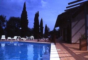 Seasonal outdoor pool, pool umbrellas, pool loungers