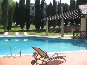 Seasonal outdoor pool, pool umbrellas, sun loungers