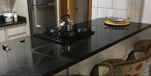 Apartment, 2 Bedrooms | Private kitchen | Fridge, microwave, oven, stovetop - Locar-in Gramado Brombatti (Gramado)