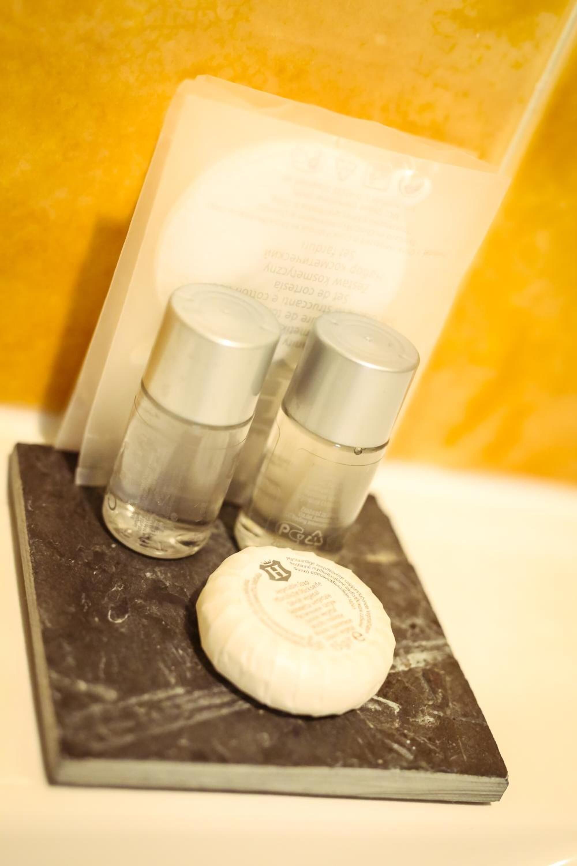 free toiletries, slippers, bidet, towels