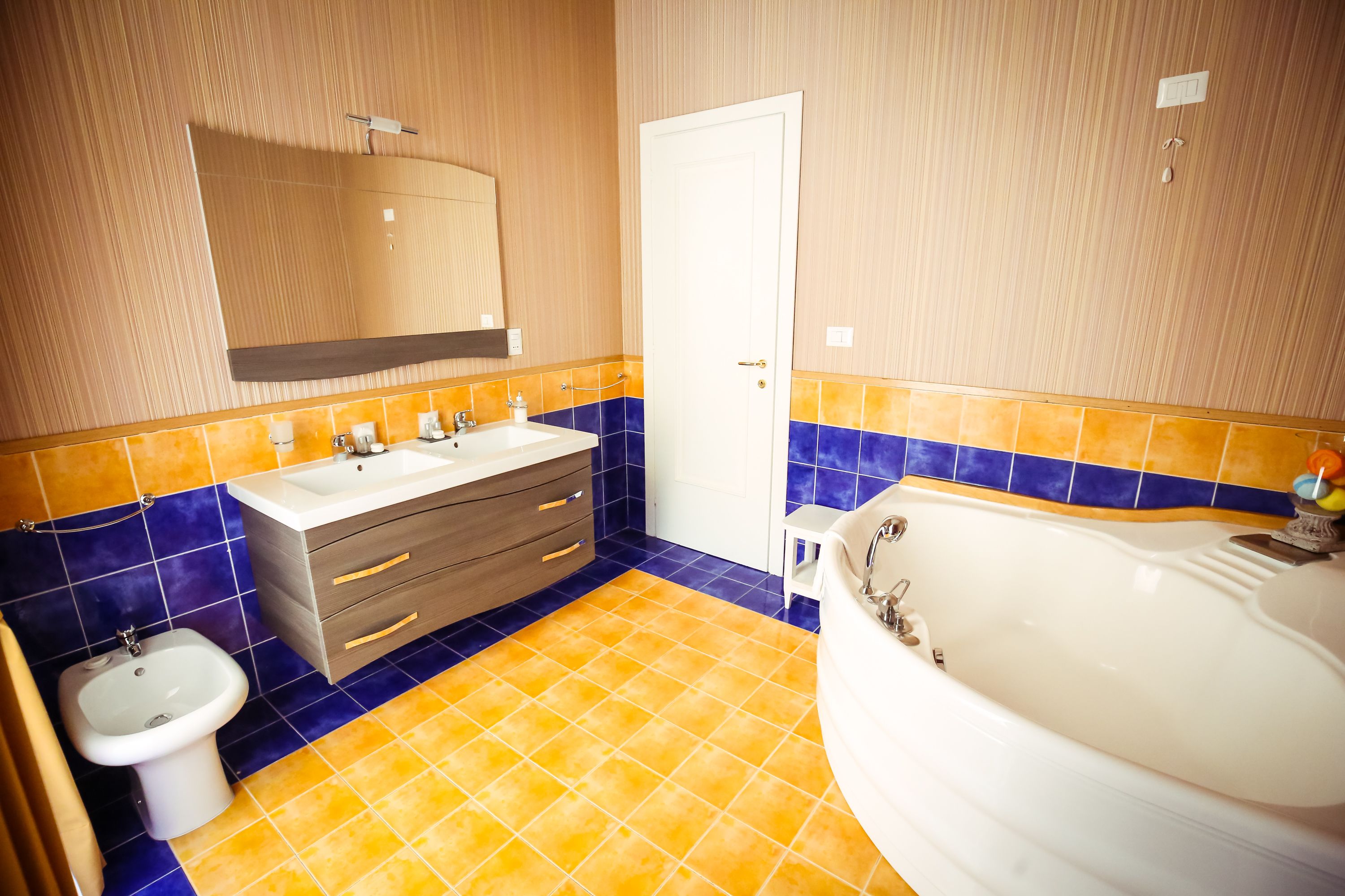 deluxe suite | bathroom | free toiletries, slippers, bidet, towels