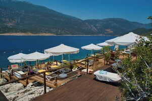 Private beach, sun loungers, beach umbrellas, beach towels