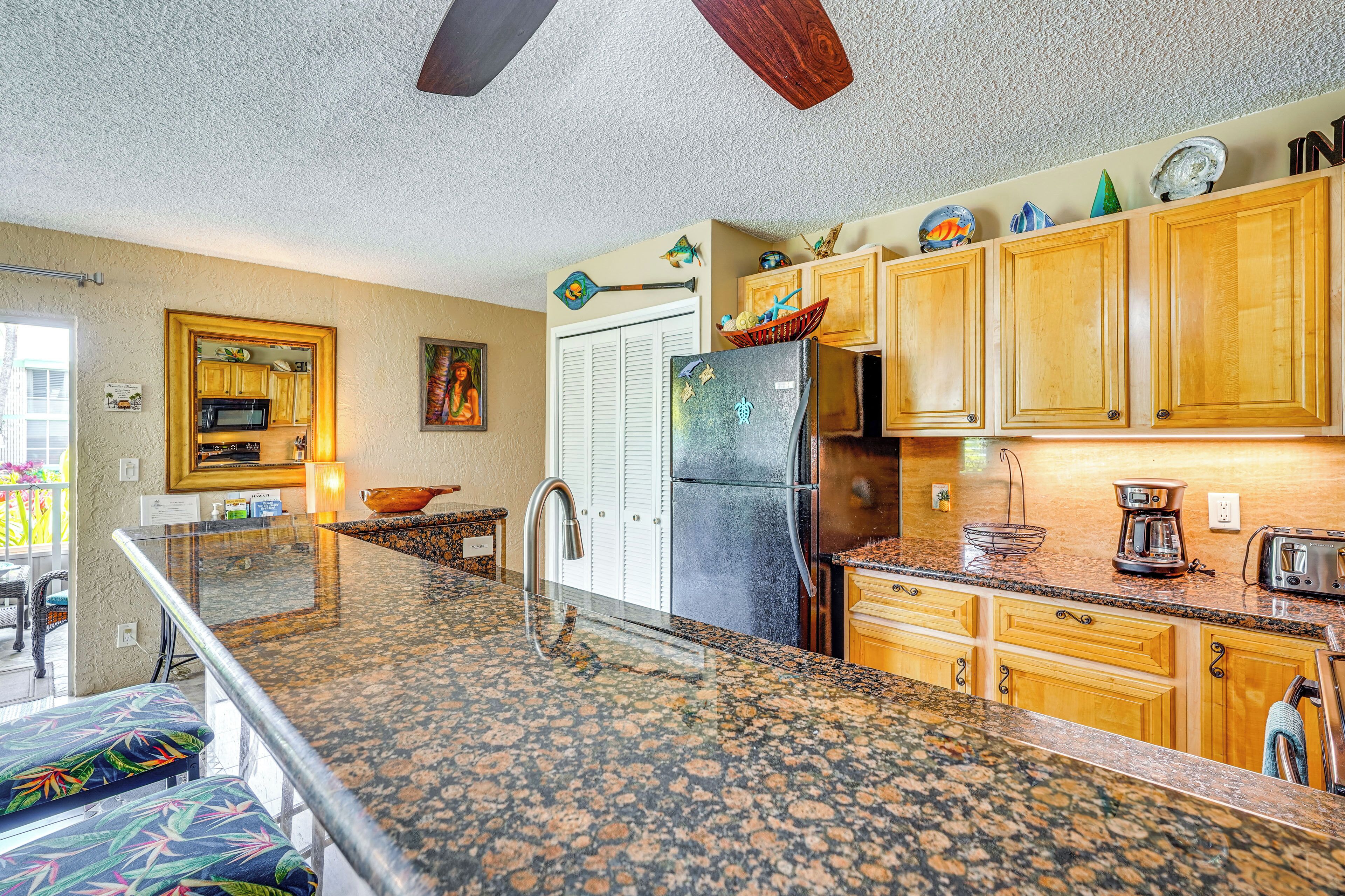 Stovetop, coffee/tea maker, cookware/dishes/utensils, dining tables