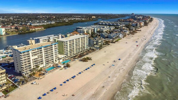 On the beach, sun-loungers, beach umbrellas, beach towels