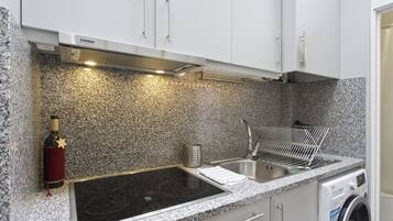 Fridge, microwave, stovetop, coffee/tea maker