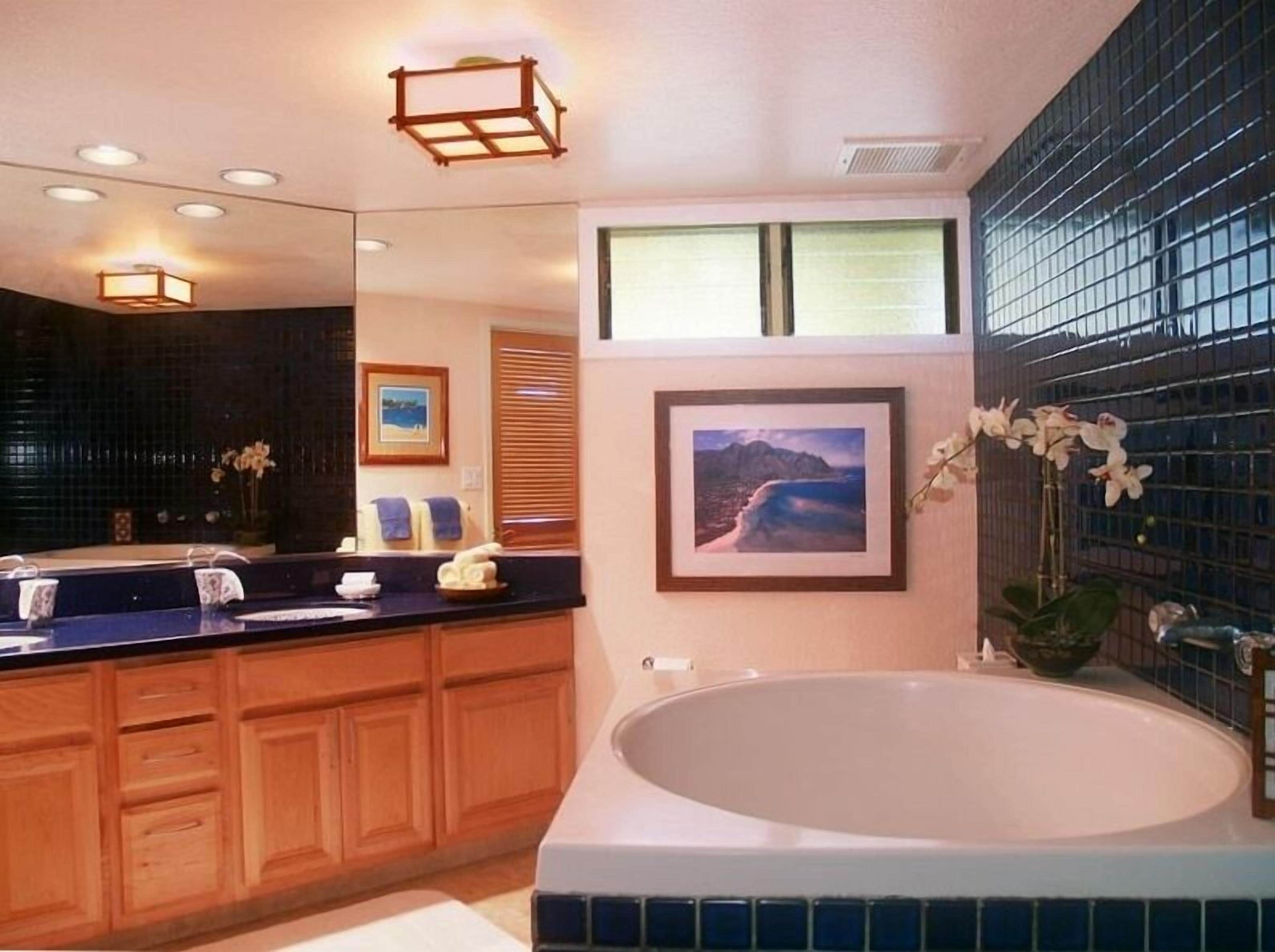 Combined shower/tub, hair dryer, towels, soap