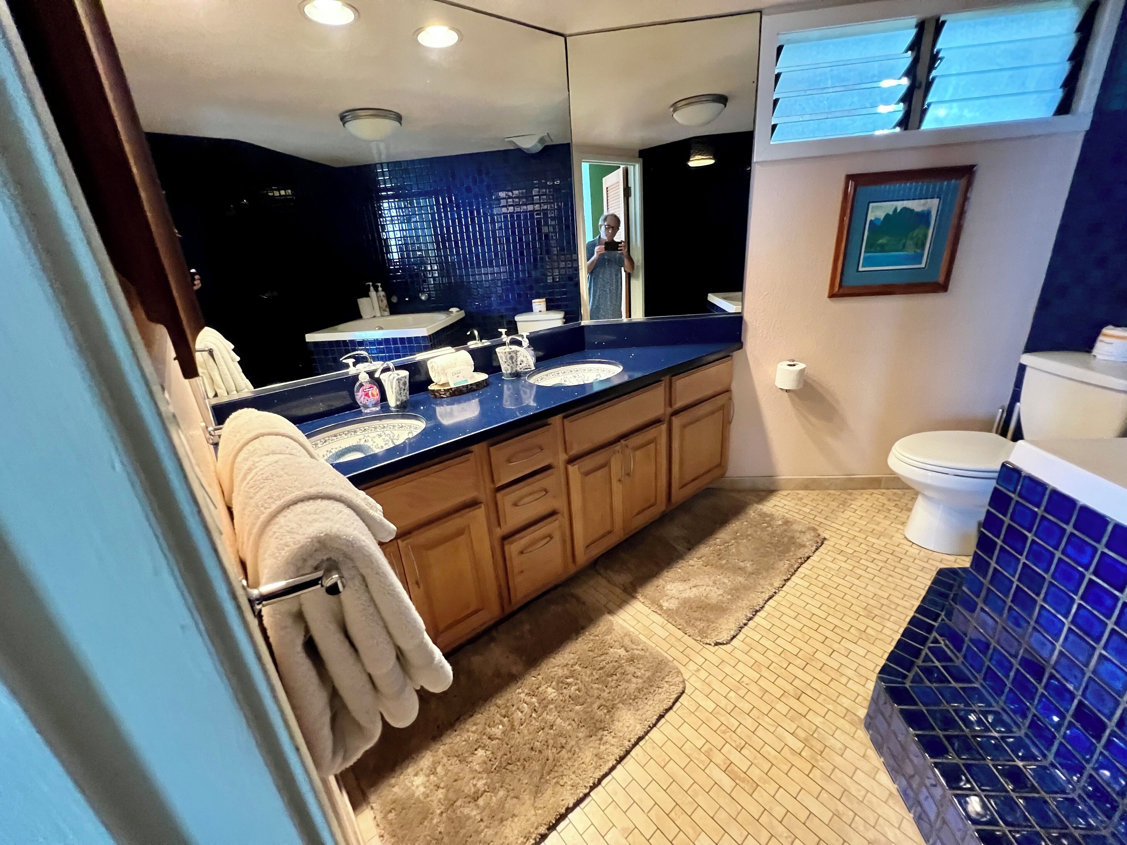 Combined shower/tub, hair dryer, towels, soap