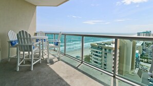 A balcony with a view of the ocean and a cityscape. - Penthouse Stunning Ocean Views Lazy River Indoor Pool (North Myrtle Beach)