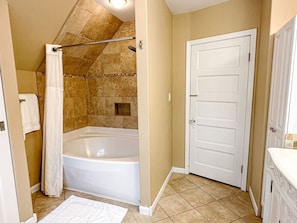Bathtub, free toiletries, hair dryer, towels