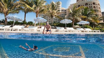 2 outdoor pools, pool umbrellas, sun loungers