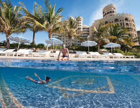 2 outdoor pools, pool umbrellas, sun loungers