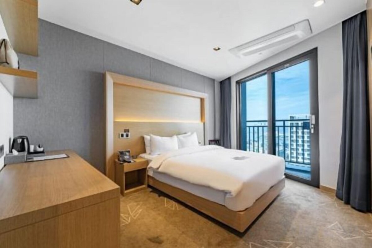 Desk, blackout drapes, soundproofing, bed sheets