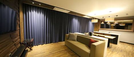 Desk, blackout drapes, soundproofing, free cribs/infant beds