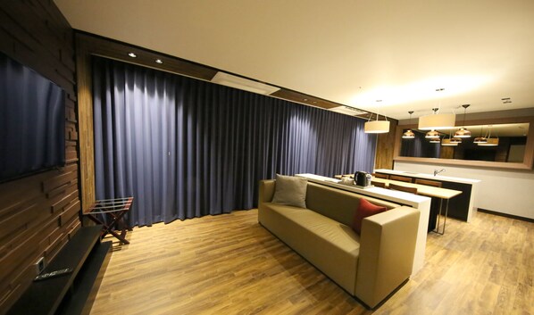 Desk, blackout drapes, soundproofing, free cribs/infant beds