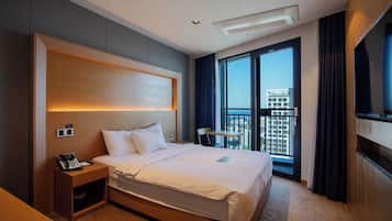 Desk, blackout drapes, soundproofing, free cribs/infant beds