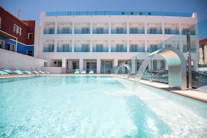 Outdoor pool, open 8:00 AM to 8:00 PM, pool umbrellas, pool loungers