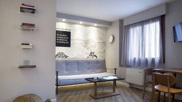 Suite Premium | Area keluarga | TV layar datar