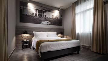 Exclusive Suite | 1 bedroom, desk, blackout drapes, iron/ironing board