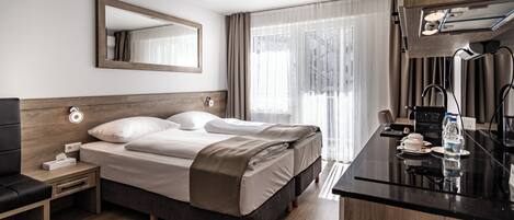 2 dormitoris, roba de llit hipoal·lergògena i caixa forta a l'habitació