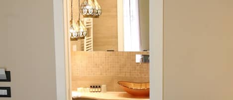 Deluxe Double Room, Balcony, City View | Bathroom | Shower, rainfall showerhead, designer toiletries, hair dryer