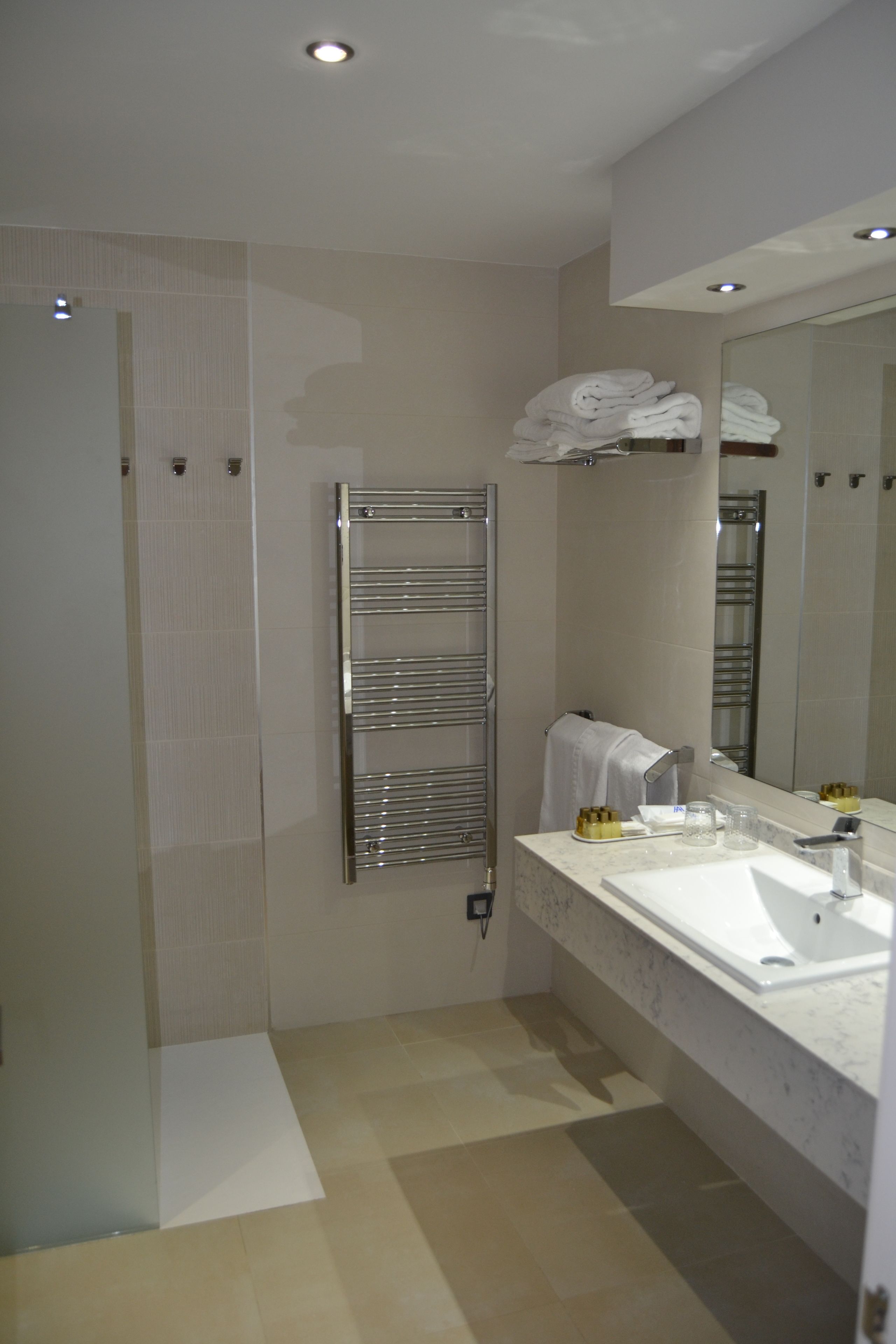 deep-soaking bathtub, free toiletries, hair dryer, towels