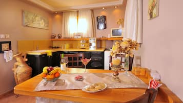 Suite | Private kitchen | Fridge, microwave, stovetop, espresso maker