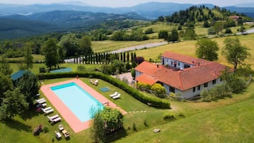 Seasonal outdoor pool, pool umbrellas, sun loungers