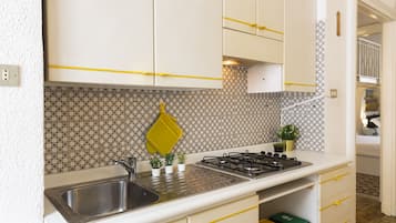 Apartment | Private kitchen | Full-size fridge, oven, stovetop, espresso maker