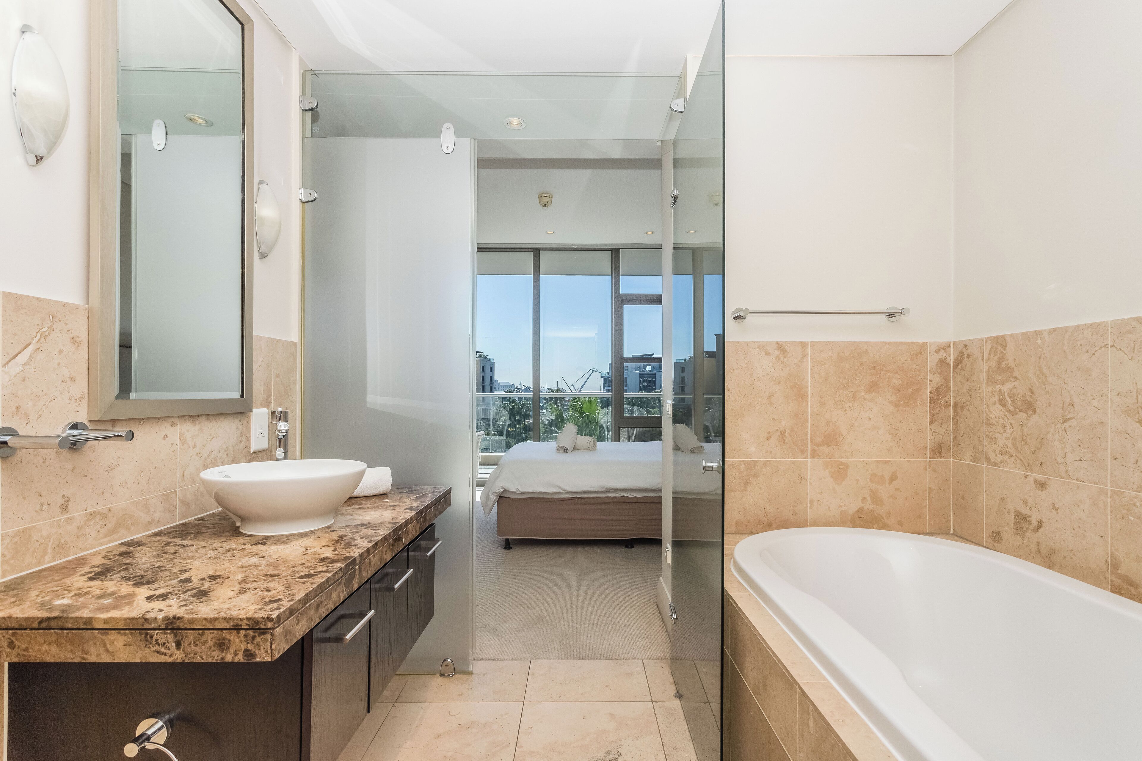 two bedroom premier 13 | bathroom | separate bathtub and shower, free toiletries, hair dryer, towels