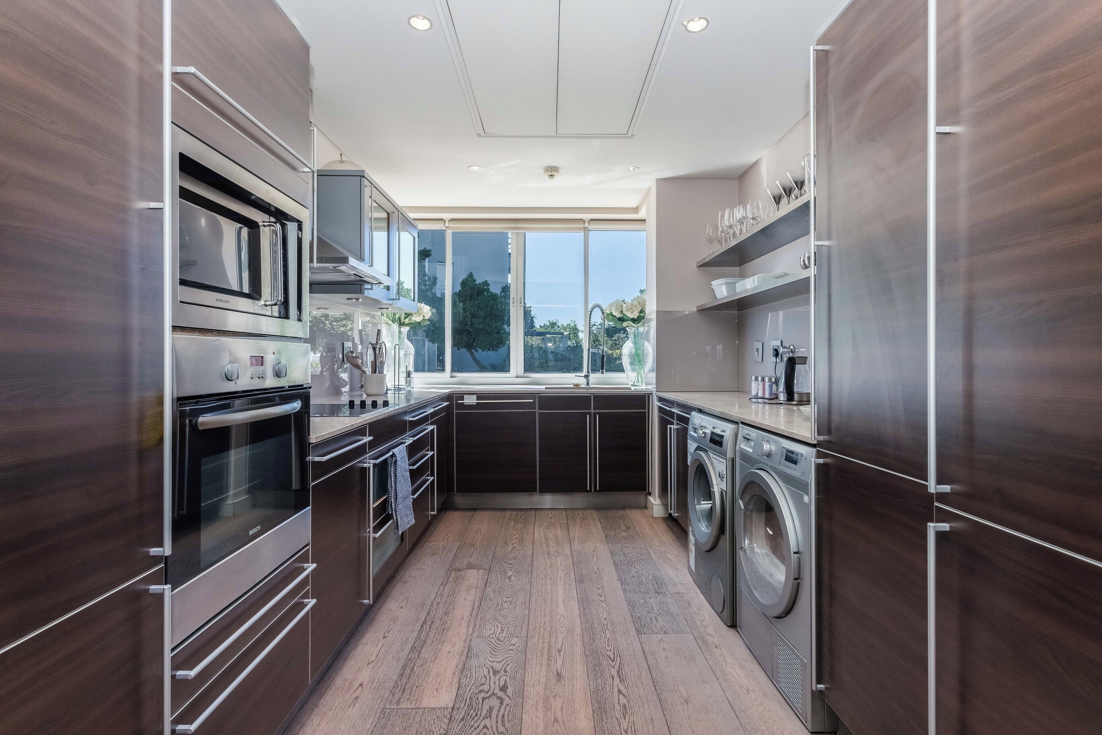 two bedroom premier 12 | private kitchen | fridge, microwave, oven, stovetop