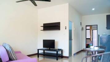 32-inch flat-screen TV with cable channels, TV