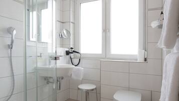 Shower, free toiletries, hair dryer, towels