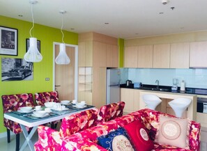 Two Bedrooms Condo  | Living area | Flat-screen TV