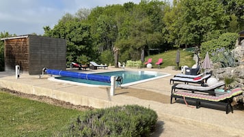 Seasonal outdoor pool, pool umbrellas, pool loungers
