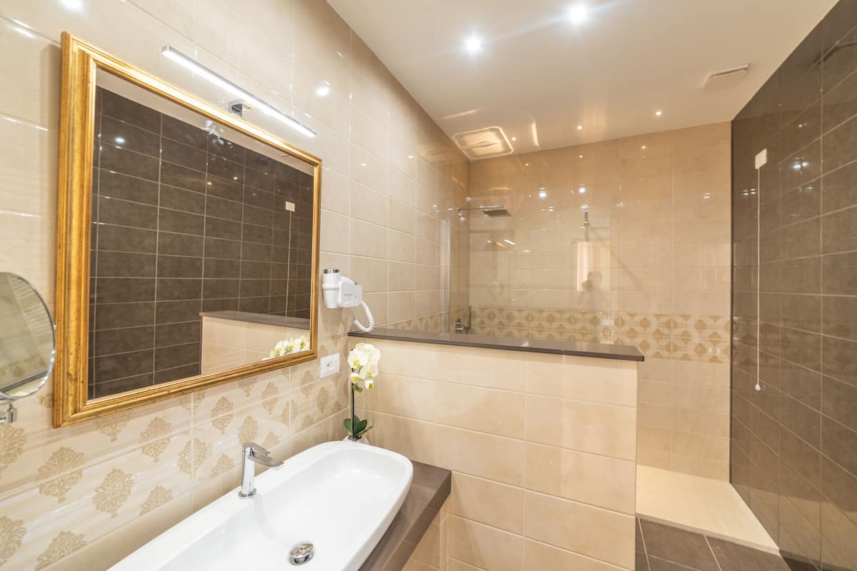 junior suite, 1 queen bed, terrace | bathroom | shower, free toiletries, hair dryer, bidet