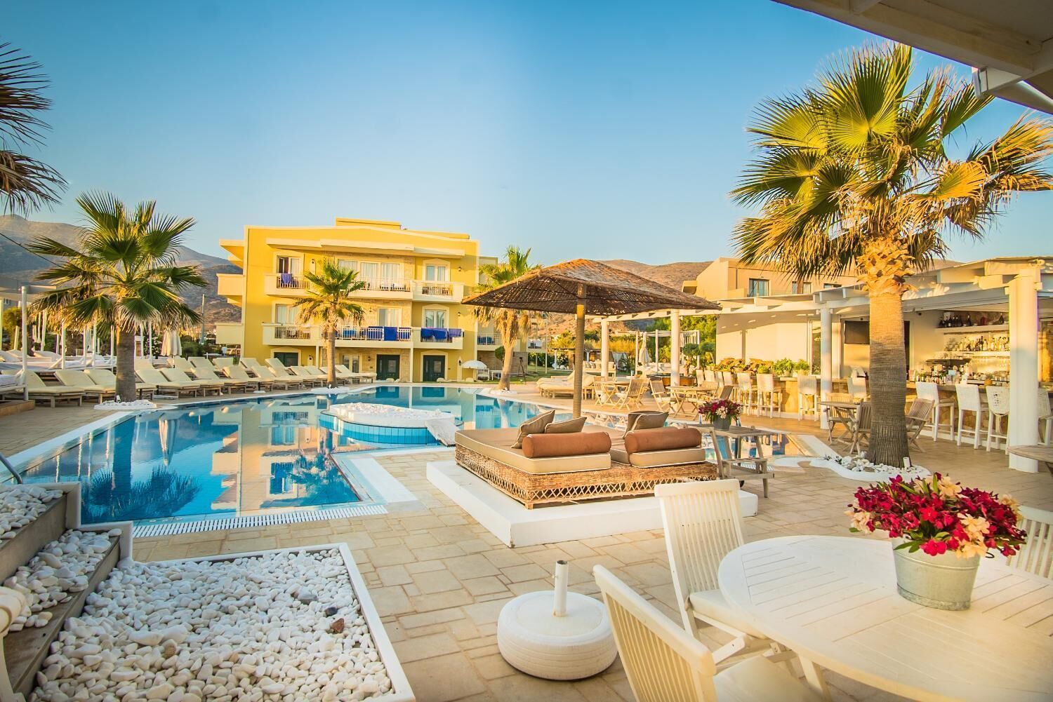 Outdoor pool, pool umbrellas, sun loungers