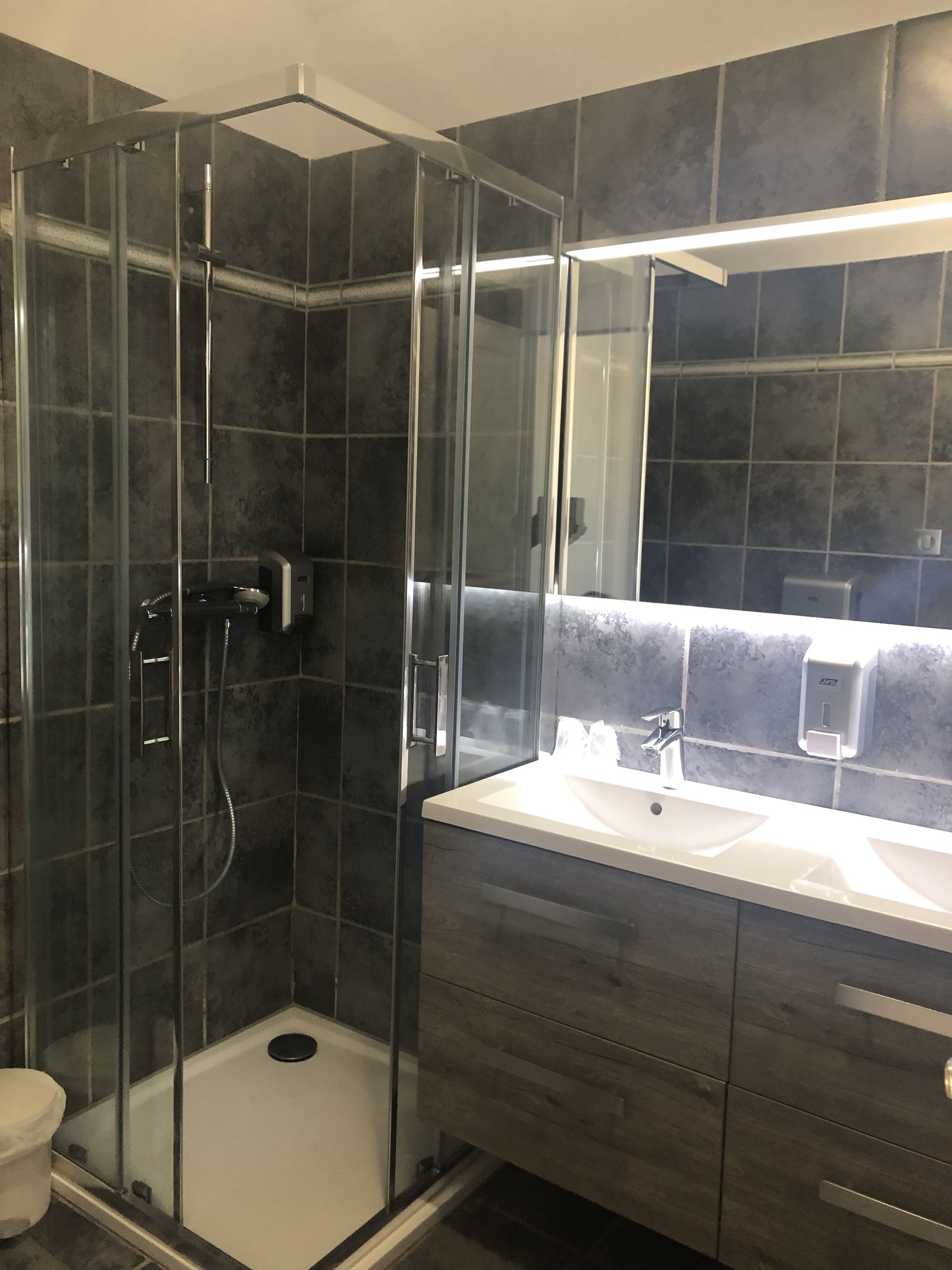 family room | bathroom | shower, free toiletries, hair dryer, towels
