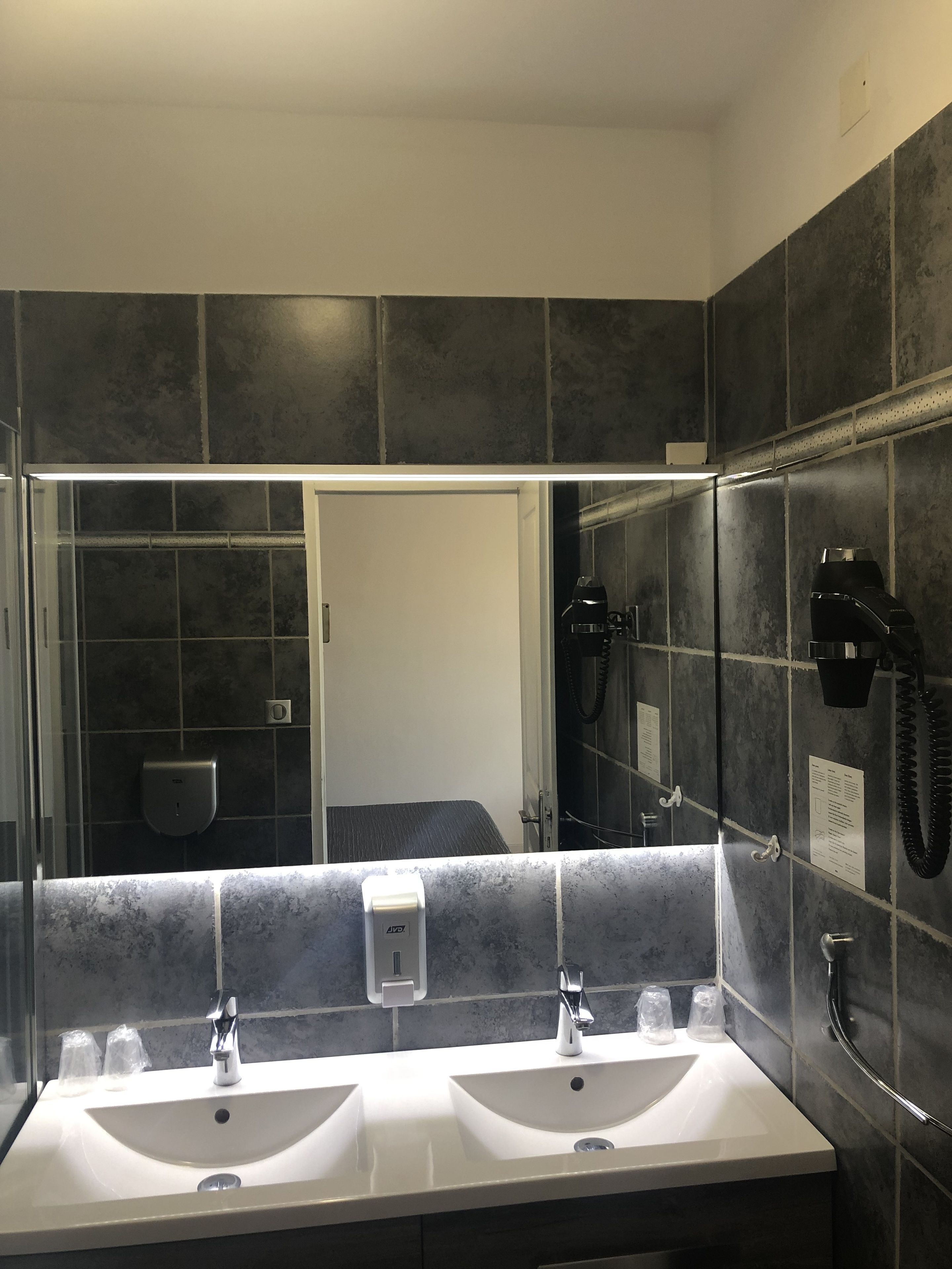 family room | bathroom | shower, free toiletries, hair dryer, towels